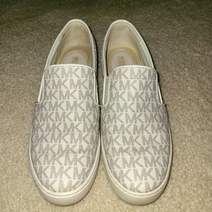 Michael Kors white slip on sneakers